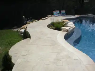 Patterned stamped concrete used for pool decking | Charleston Concrete
